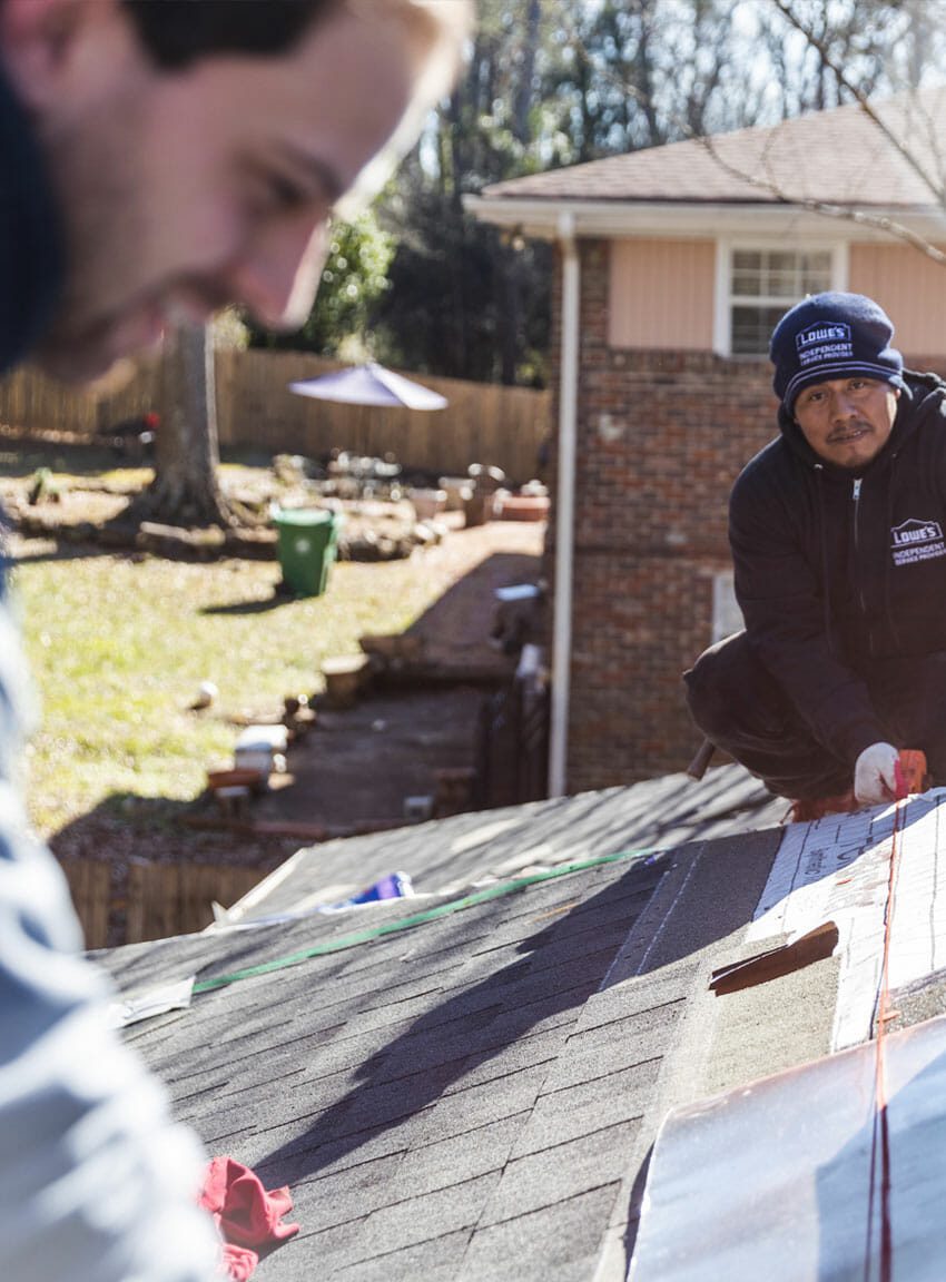 Lowe's Independent Service Provider partner working on shingles during an active RCB Roofing job.